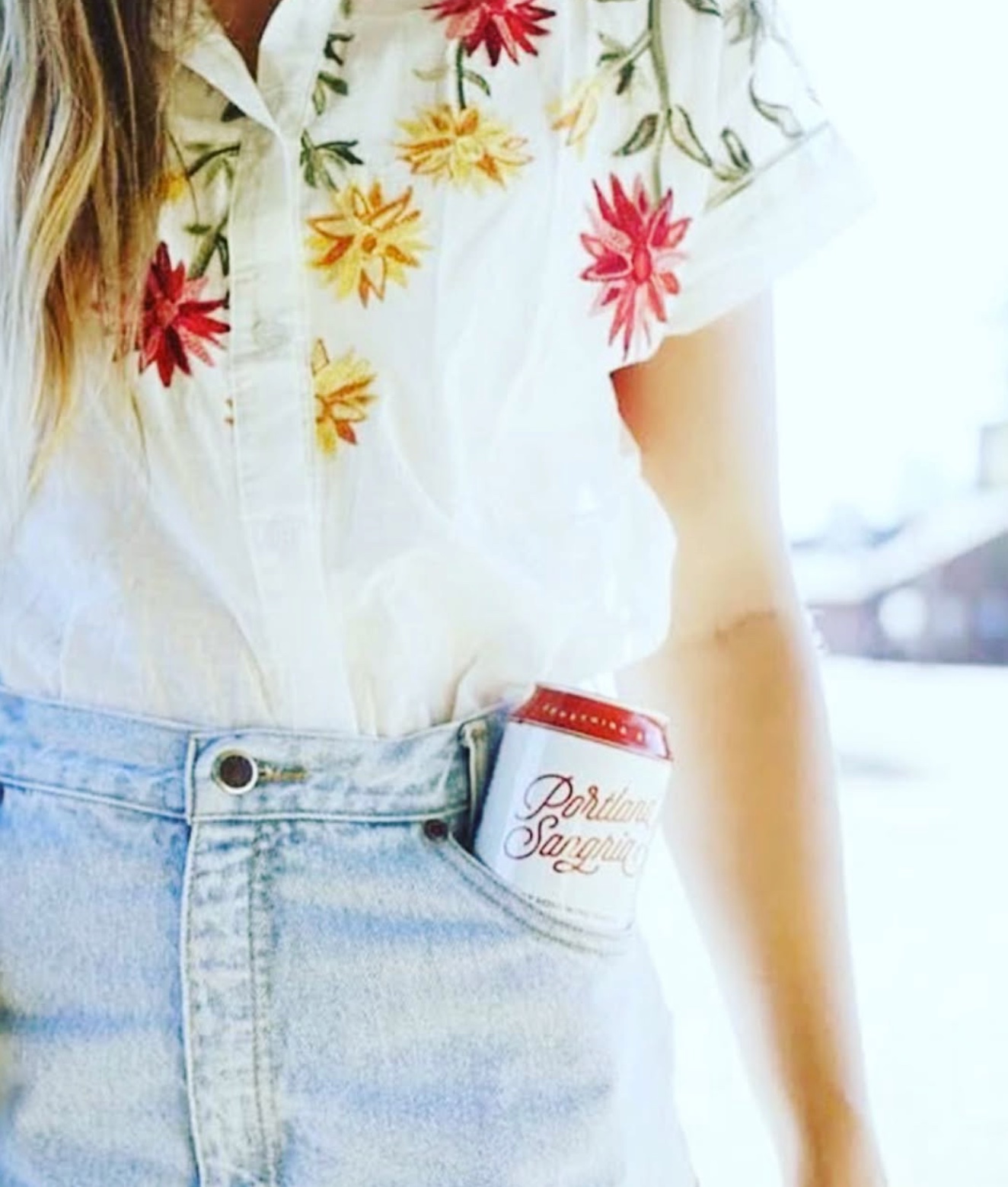 A can of Portland Sangria tucked in a back jeans pocket